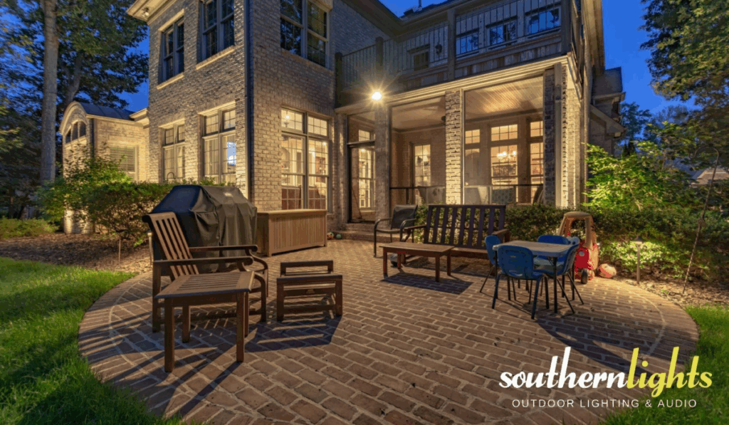 Professional holiday lighting installation highlighting rooflines and outdoor spaces